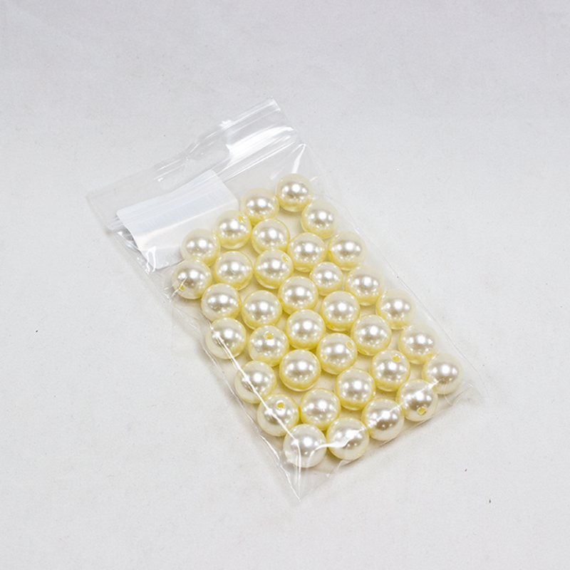 Perolas 14 mm Marfim (35 Un.)