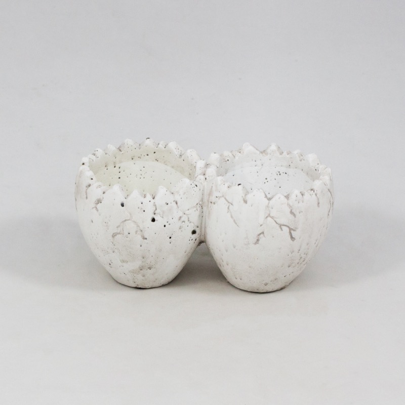 Ovo duplo em cerâmica eclodido a cor natural