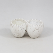 Ovo duplo em cerâmica eclodido a cor natural