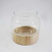 Vaso de vidro com base em madeira